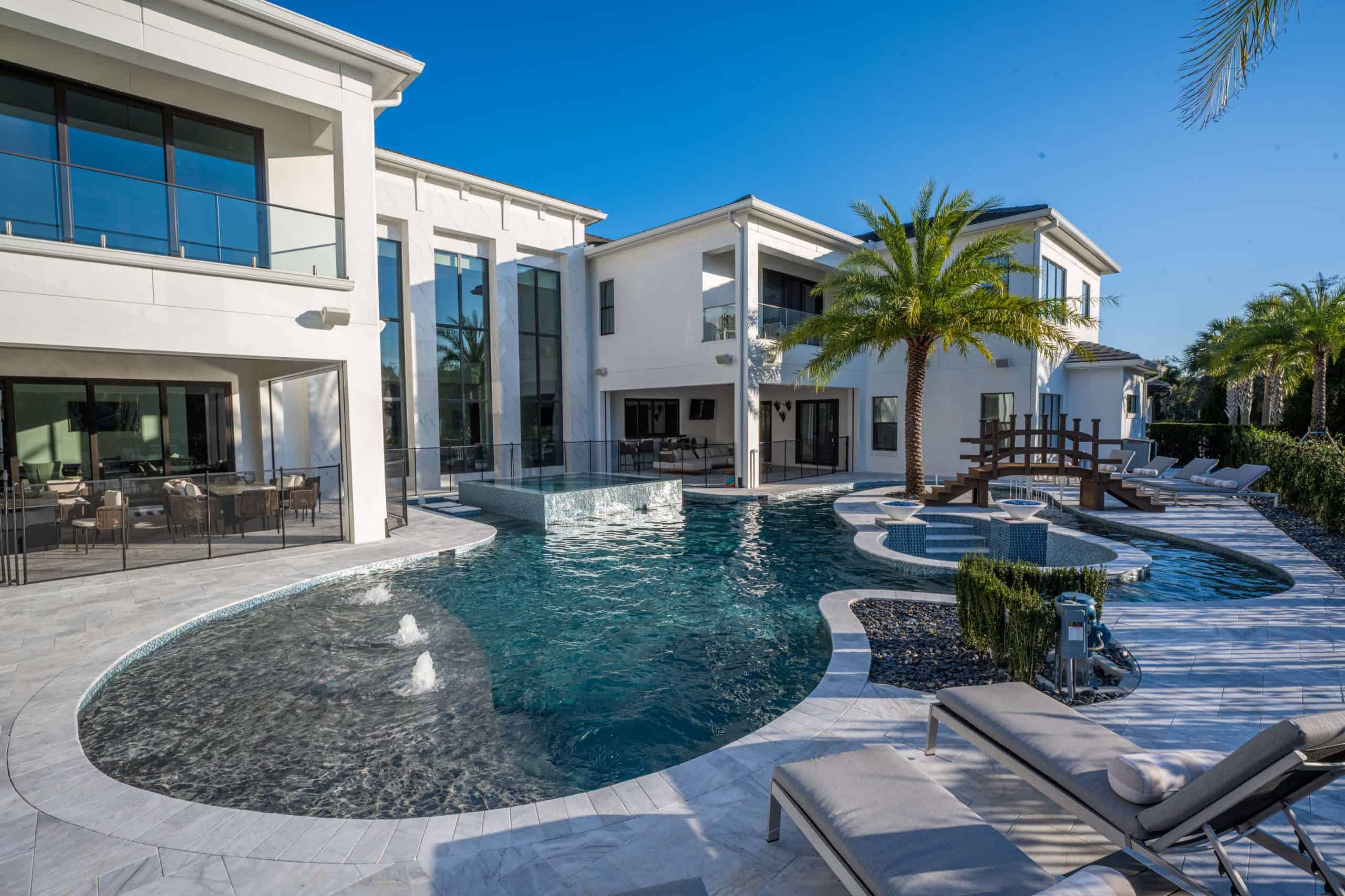 Modern backyard pool with spa and lounge area in Melbourne, Brevard County FL