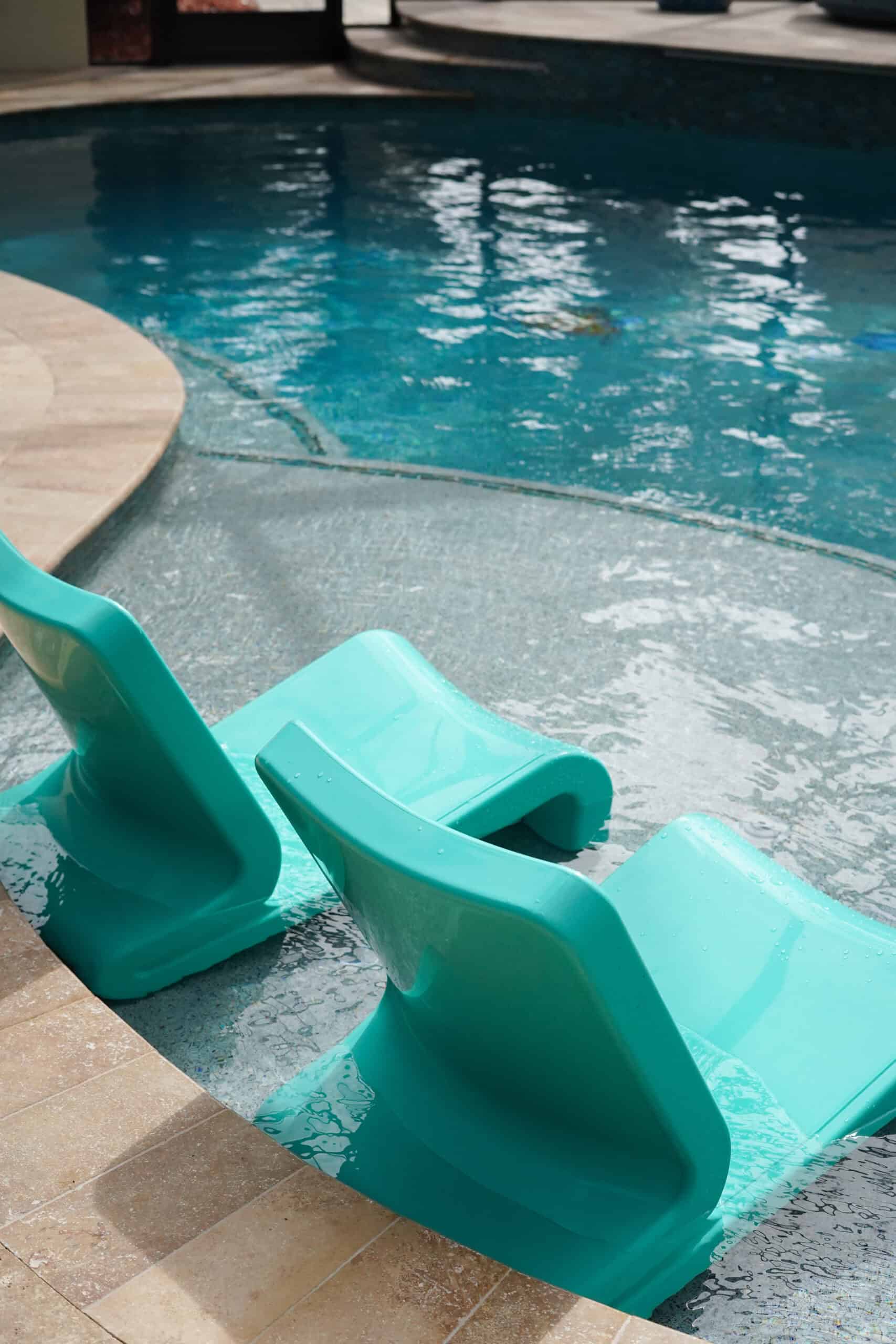 Shallow tanning shelf on a zero entry pool, engineered with dedicated circulation